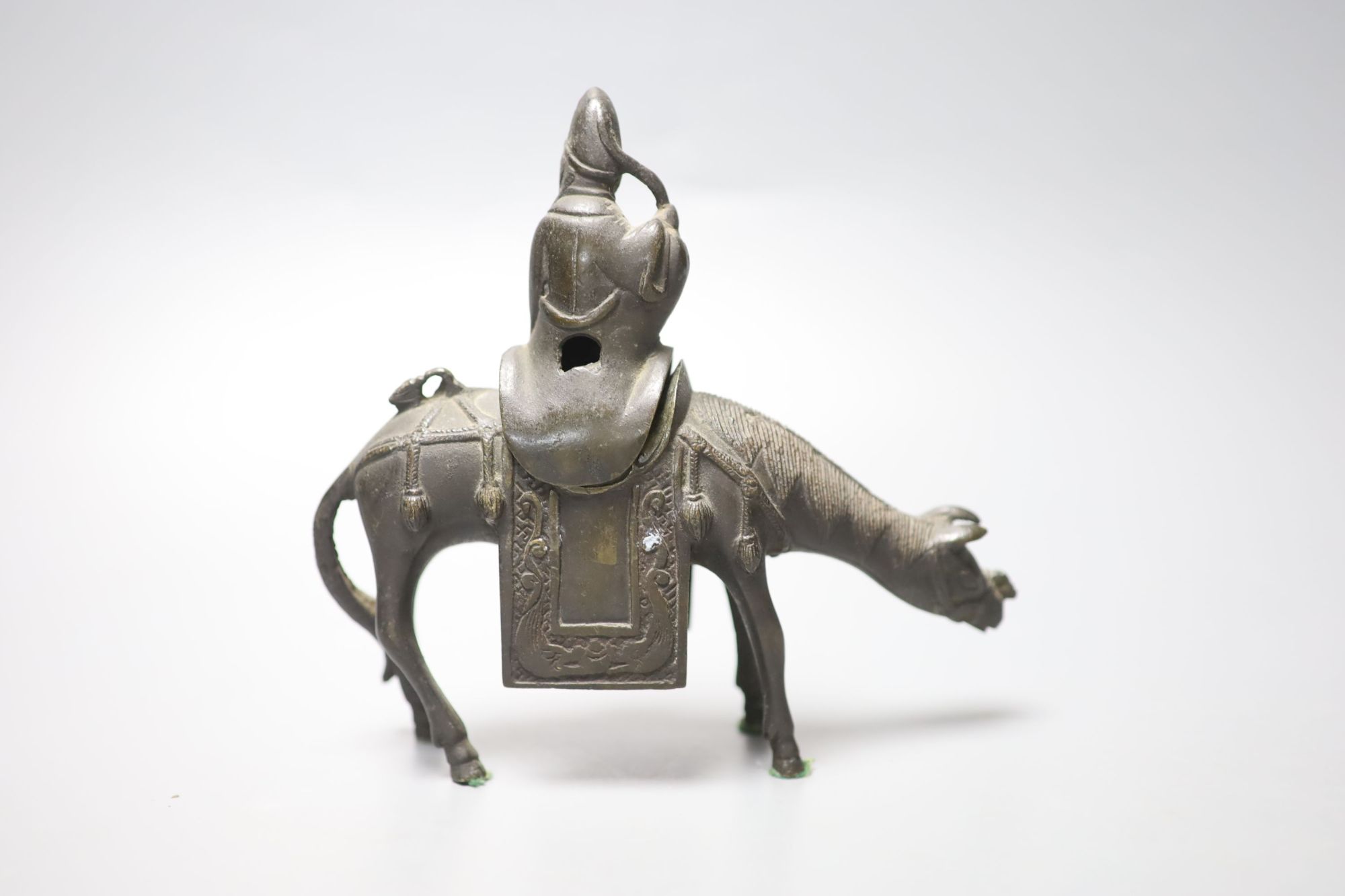 A 17th century Chinese bronze sage riding a horse censer, 15.2cm high